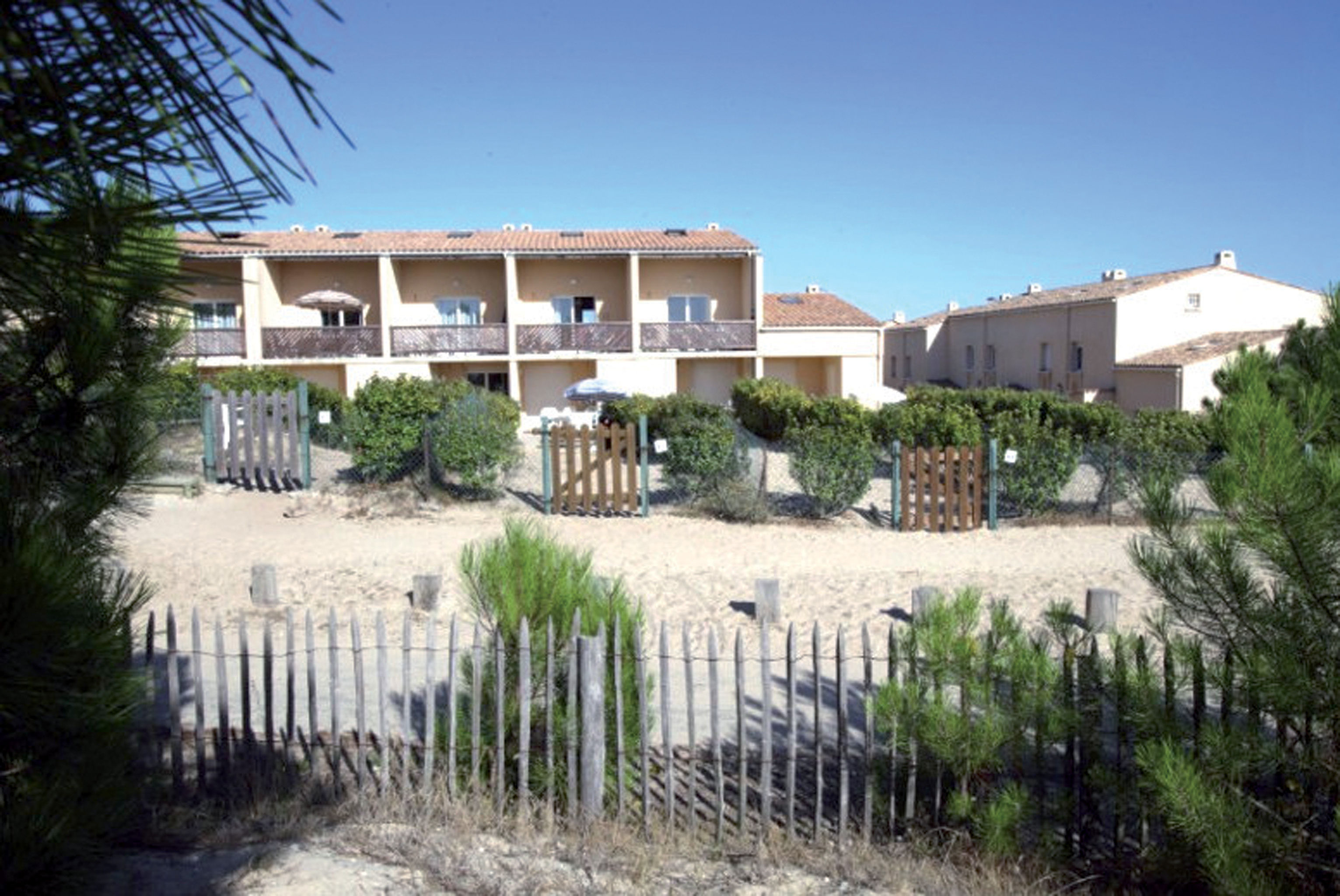 image Experience the best of seaside serenity with direct beach access.