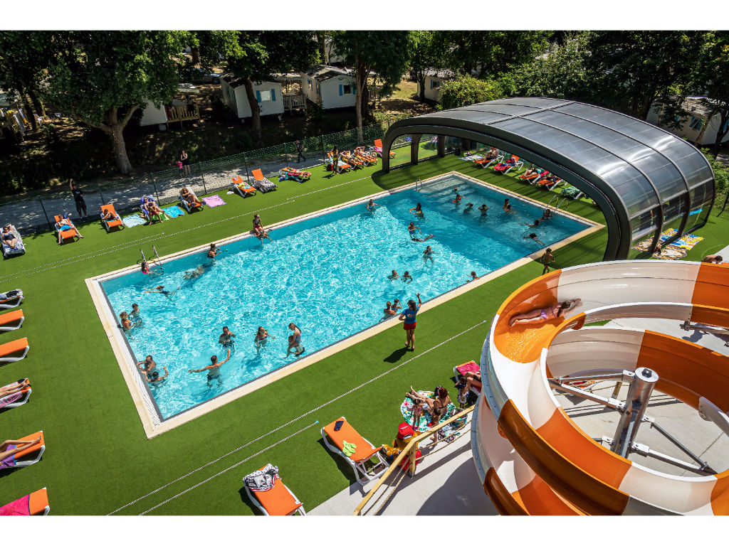 image Large outdoor pool area, where guests can swim, relax, and soak up the sun.