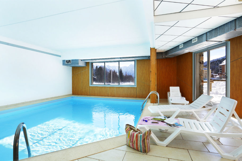 image Take in gorgeous views while lounging around the on-site indoor pool.