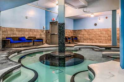 Melt away your worries in our soothing indoor hot tub, a haven of warmth amidst the mountain chill