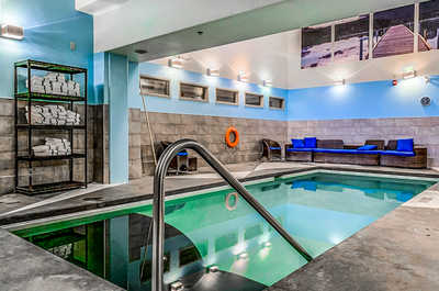 Dive into relaxation with our serene indoor pool.