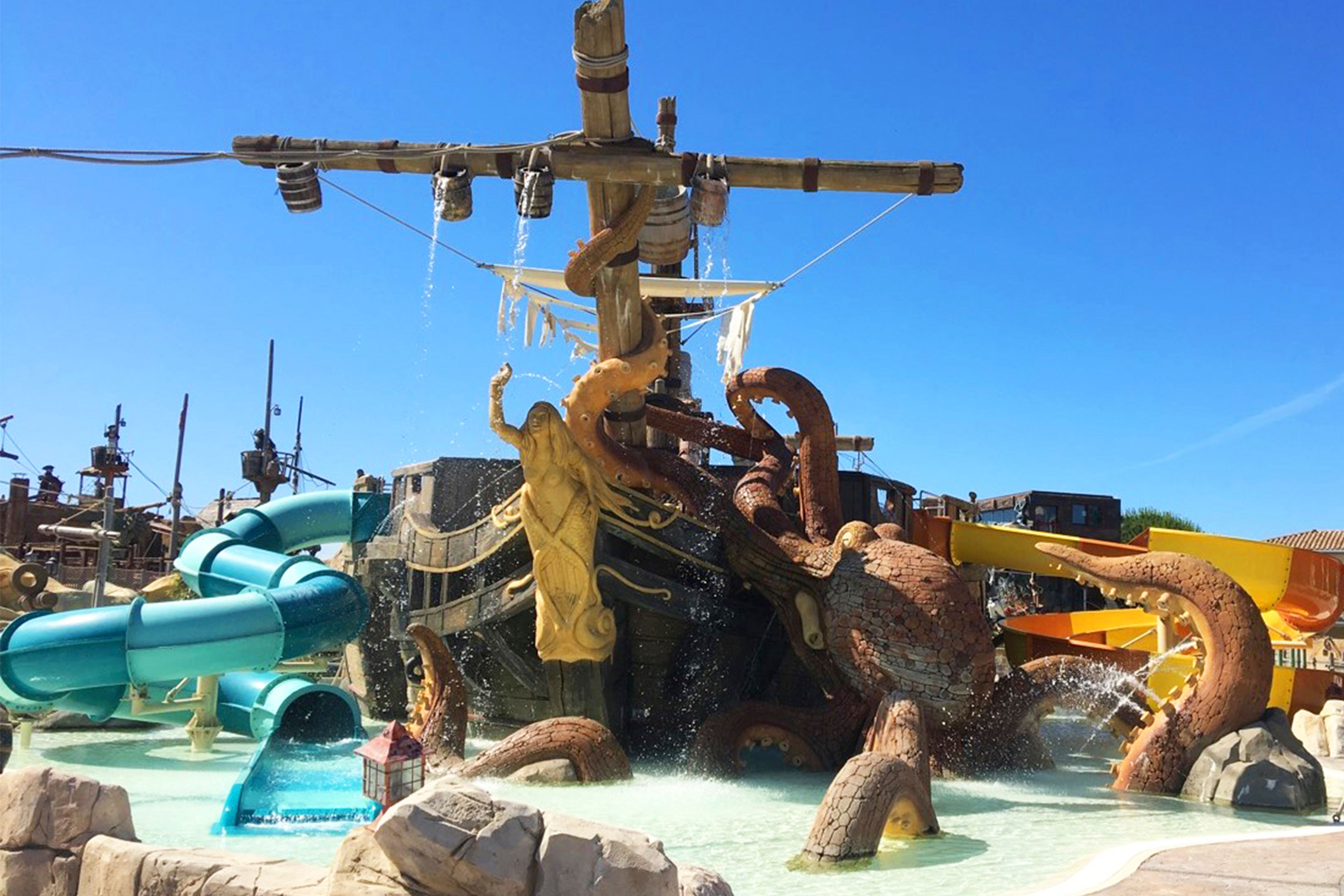 image Pirate-themed water playground with slides and splash features, perfect for adventurous kids.