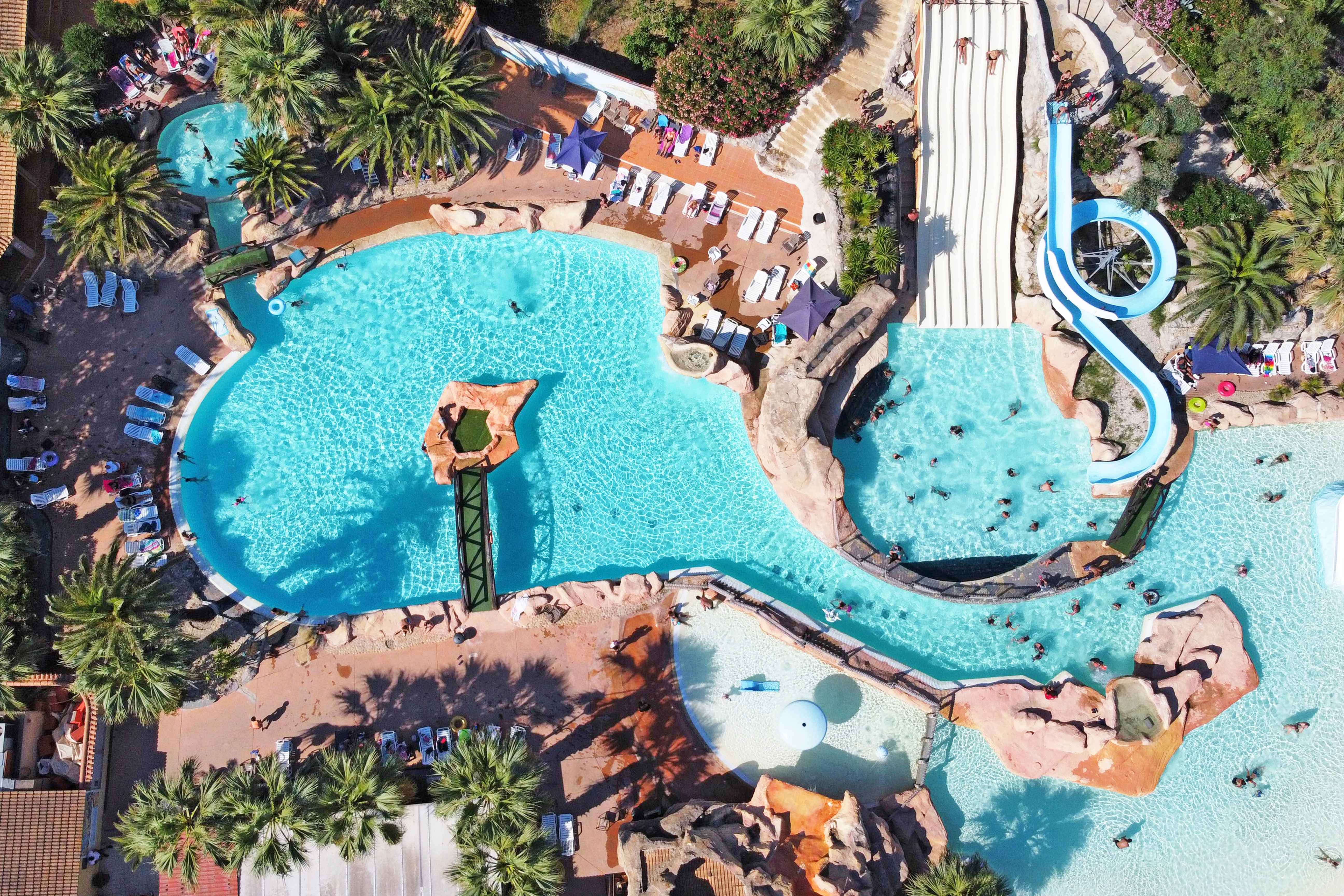 image Aerial view of a vibrant water park, featuring winding slides and multiple pools for endless fun.