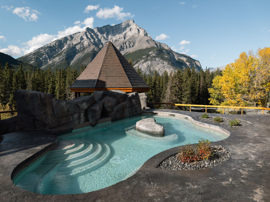 image A rooftop oasis with a serene pool, framed by stunning mountain vistas and crisp, fresh air.