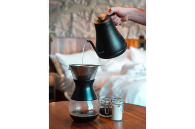 Begin your morning with a freshly brewed cup of coffee, savoring the rich aroma and tranquil start to your day.