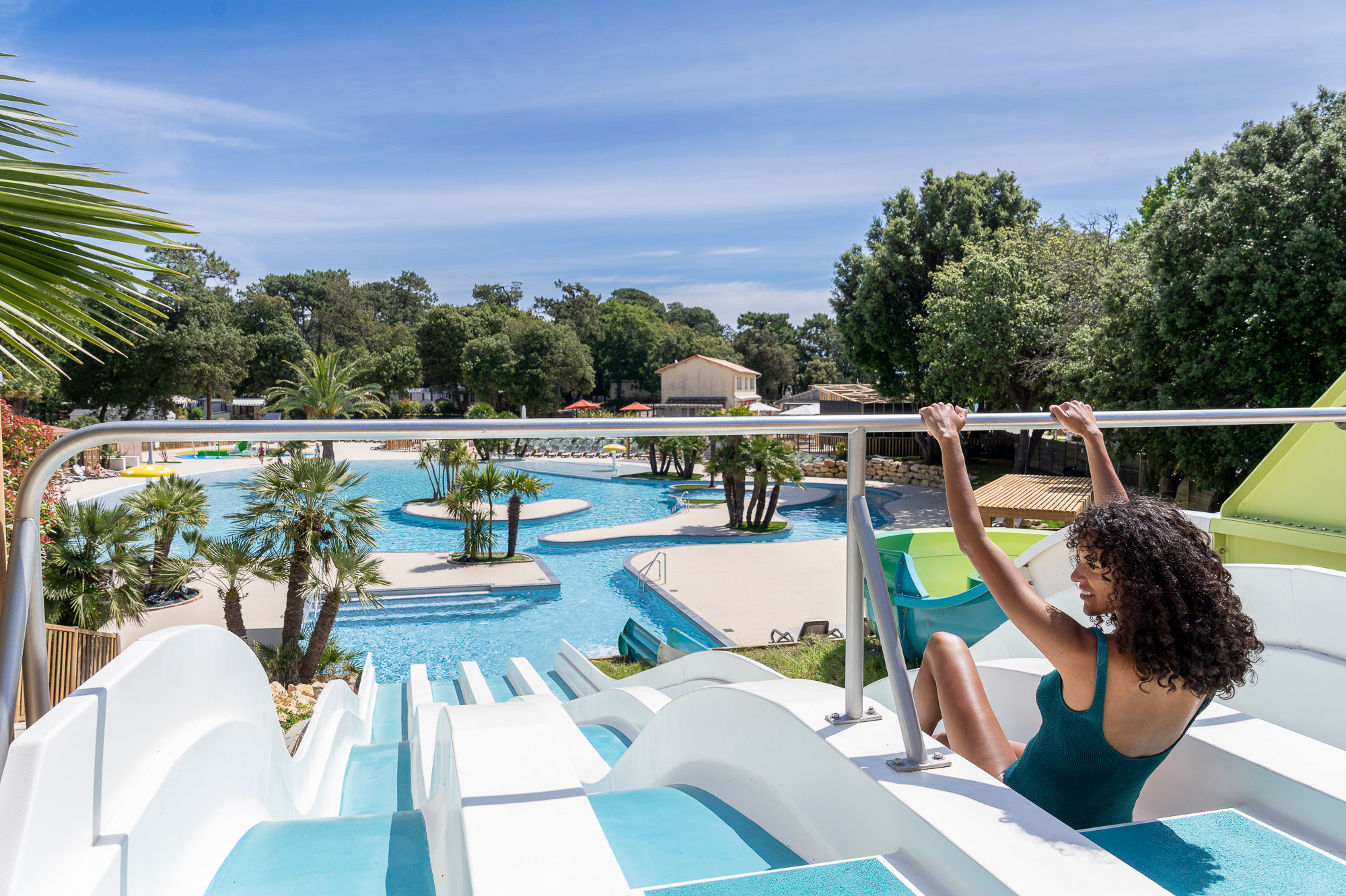 image Unwind by the pool in style, where lounge chairs and tropical vibes set the stage for ultimate relaxation.