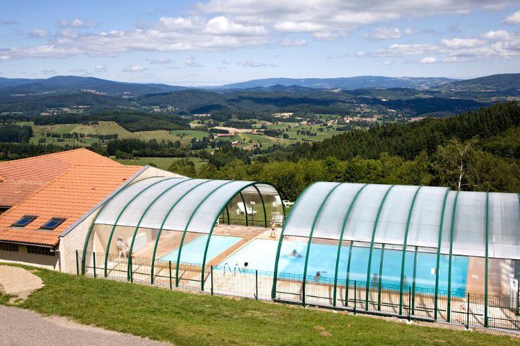 image Indulge in our seasonal pool with a removable roof—open from mid-June to mid-September for sun-soaked swims or sheltered relaxation,