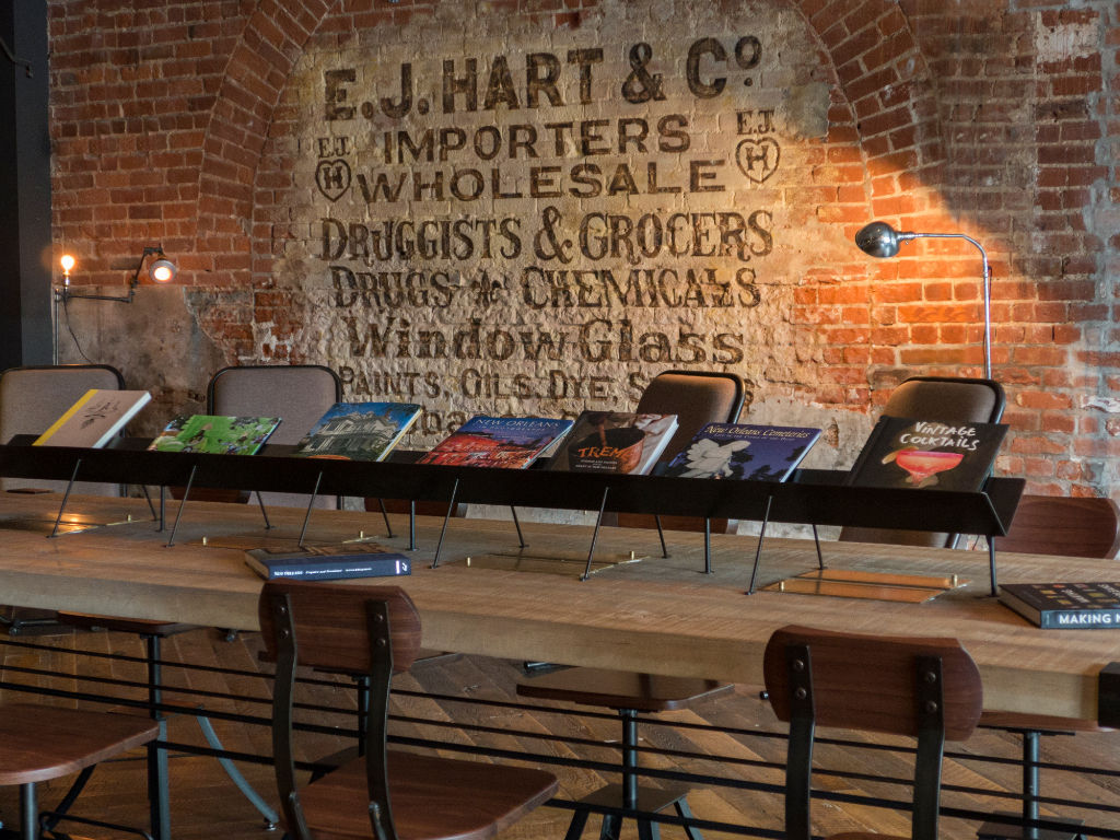 image Historic character shines through in Hotel Old 77's lobby with brick walls and antique decor