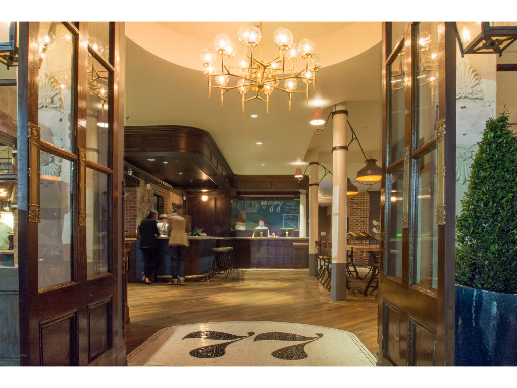 image Welcoming lobby of Hotel Old 77 with elegant chandeliers and a vintage aesthetic