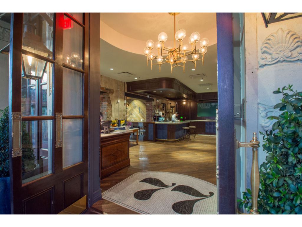 image Chic and charming entrance with vibrant plant accents in the hotel lobby