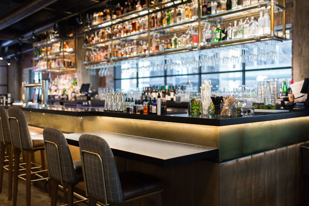 image Savor handcrafted cocktails in our chic bar, perfect for evening socials or a nightcap.