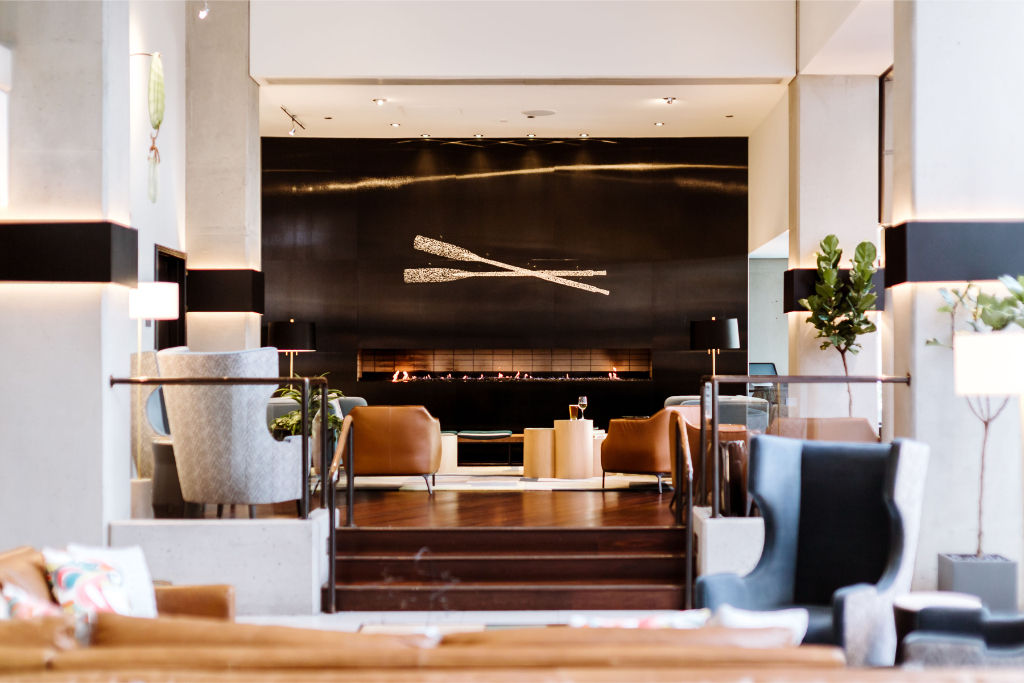 image Our lobby's spacious layout includes a stylish living area that flows effortlessly into the dining space, perfect for casual meetings.