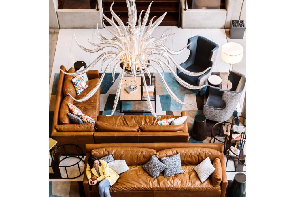 image Discover a corner of intrigue in our lobby, featuring an eclectic mix of artistic elements and plush seating for intimate meaningful conversations.