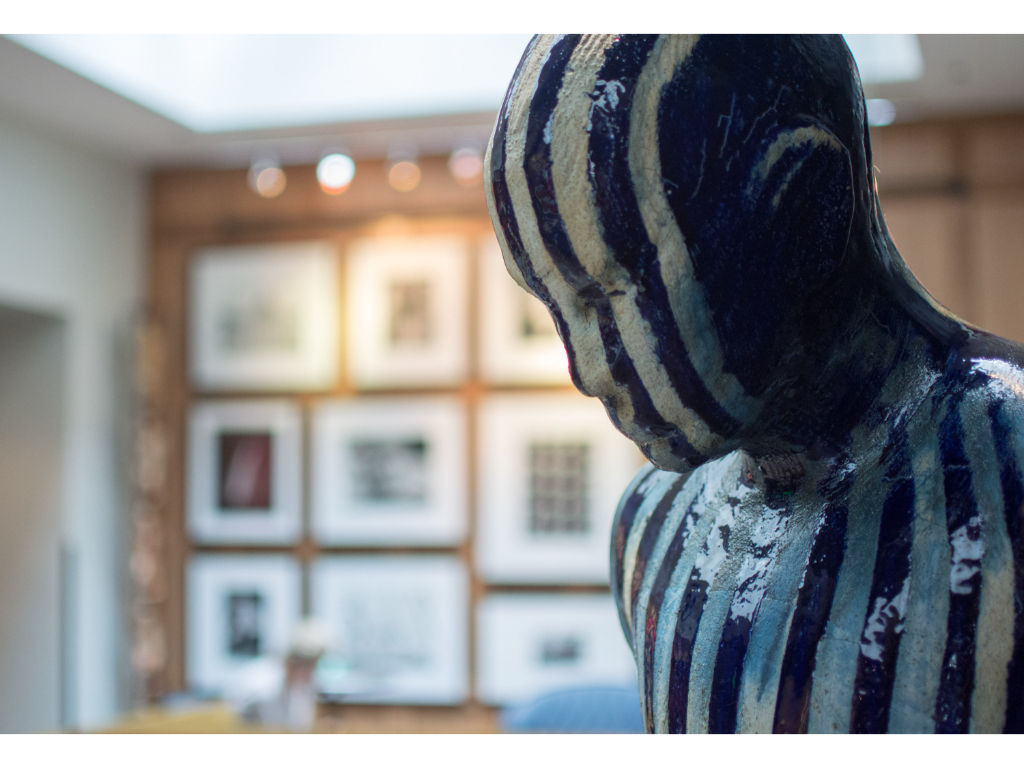 image A captivating sculpture from our in-house art collection, enhancing the cultural ambiance.