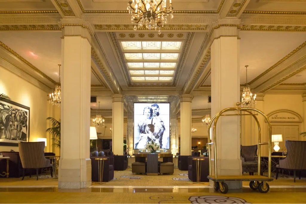 image Spacious and opulent, our lobby features a stunning chandelier and ample seating, making it the perfect place to unwind.