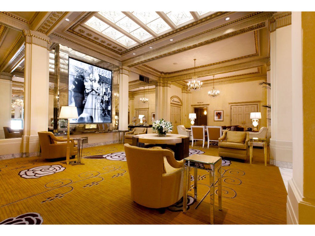 image Experience the grandeur of our hotel lobby, complete with plush seating areas and exquisite artistic touches.