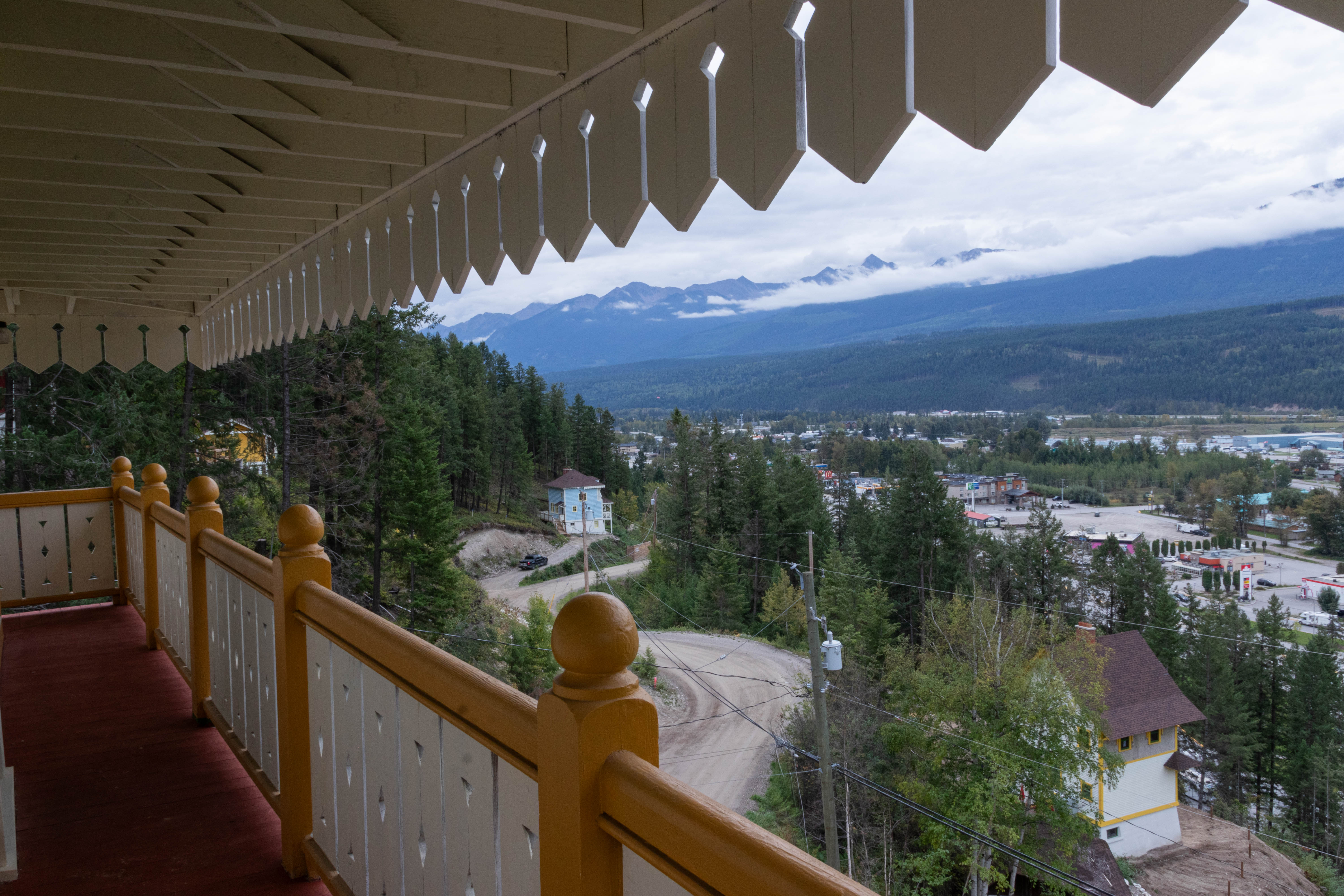 image Step out onto the balcony and soak in the breathtaking mountain views, perfect for a relaxing moment.
