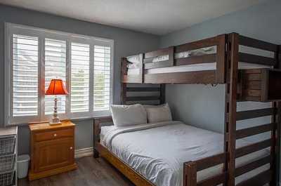  Perfect for kids or additional guests, the bedroom includes convenient twin over double beds.