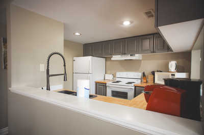 Prepare meals in the modern kitchen equipped with all the essential appliances.