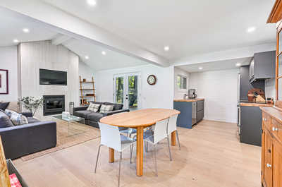 Open-concept living and dining area, perfect for relaxing and entertaining, with modern furnishings.