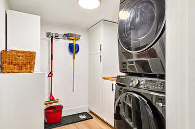 Convenient laundry room with a washer and dryer, making longer stays even more comfortable.