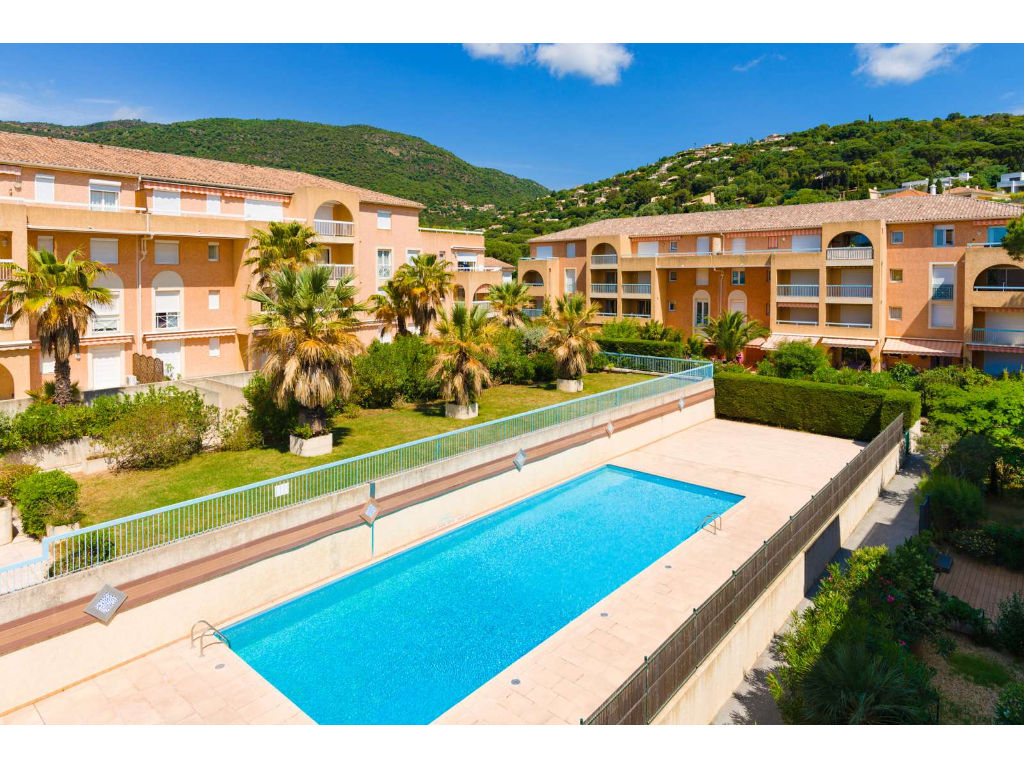 image Enjoy the serene ambiance at the pool area, where you can soak up the sun on spacious terraces while taking in views of the surrounding hills. The pool is available daily from 9 a.m. to 9 p.m. during the warm months.