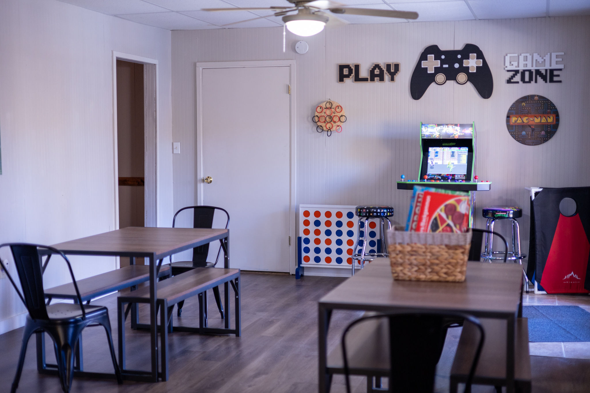 image Keep everyone entertained in this lively game room, featuring classic arcade games and activities for all ages.