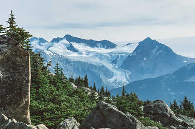 Enjoy lush green trails and mountain vistas in the summer sun.