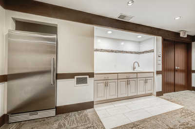 Modern kitchenette, perfect for catering or small events.