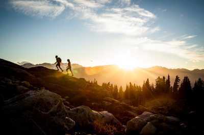 Hiking into the sunset with incredible mountain views.