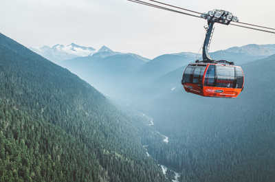 Scenic gondola ride offering stunning mountain views in the summer.