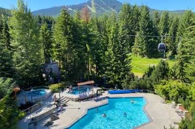 Spacious pool with mountain views, ideal for summer relaxation.
