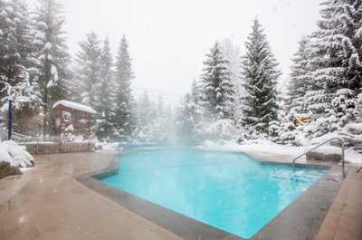Swim in winter! Steps from the slopes with ski-in, ski-out access.