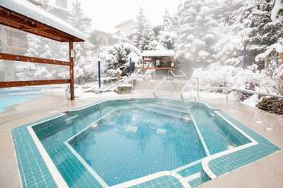 Warm up in the hot tub after skiing, just a few steps away!