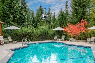 Cool off in the pool with stunning summer mountain views.