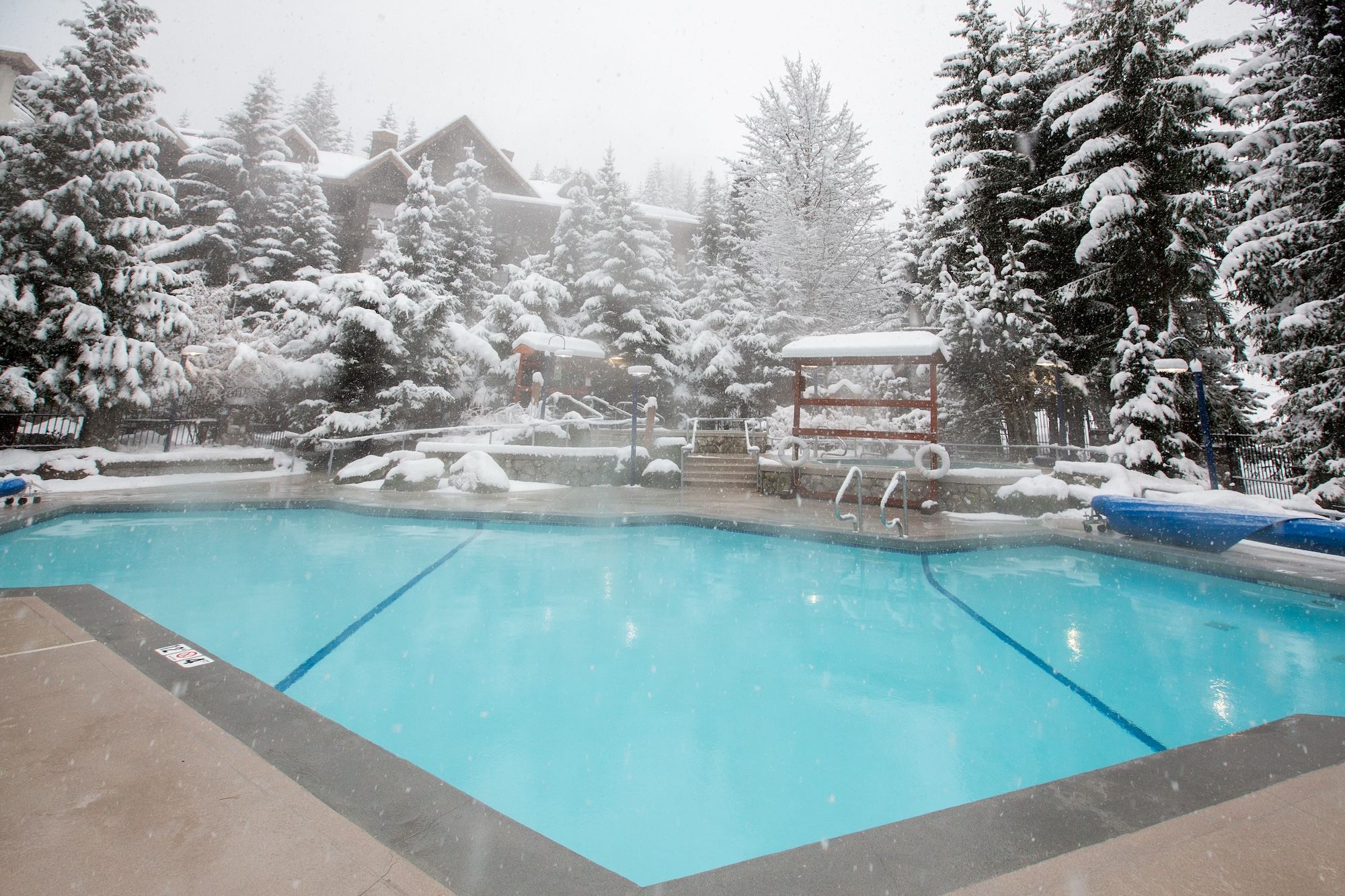 image Heated pool surrounded by snow. Ski right to your door.