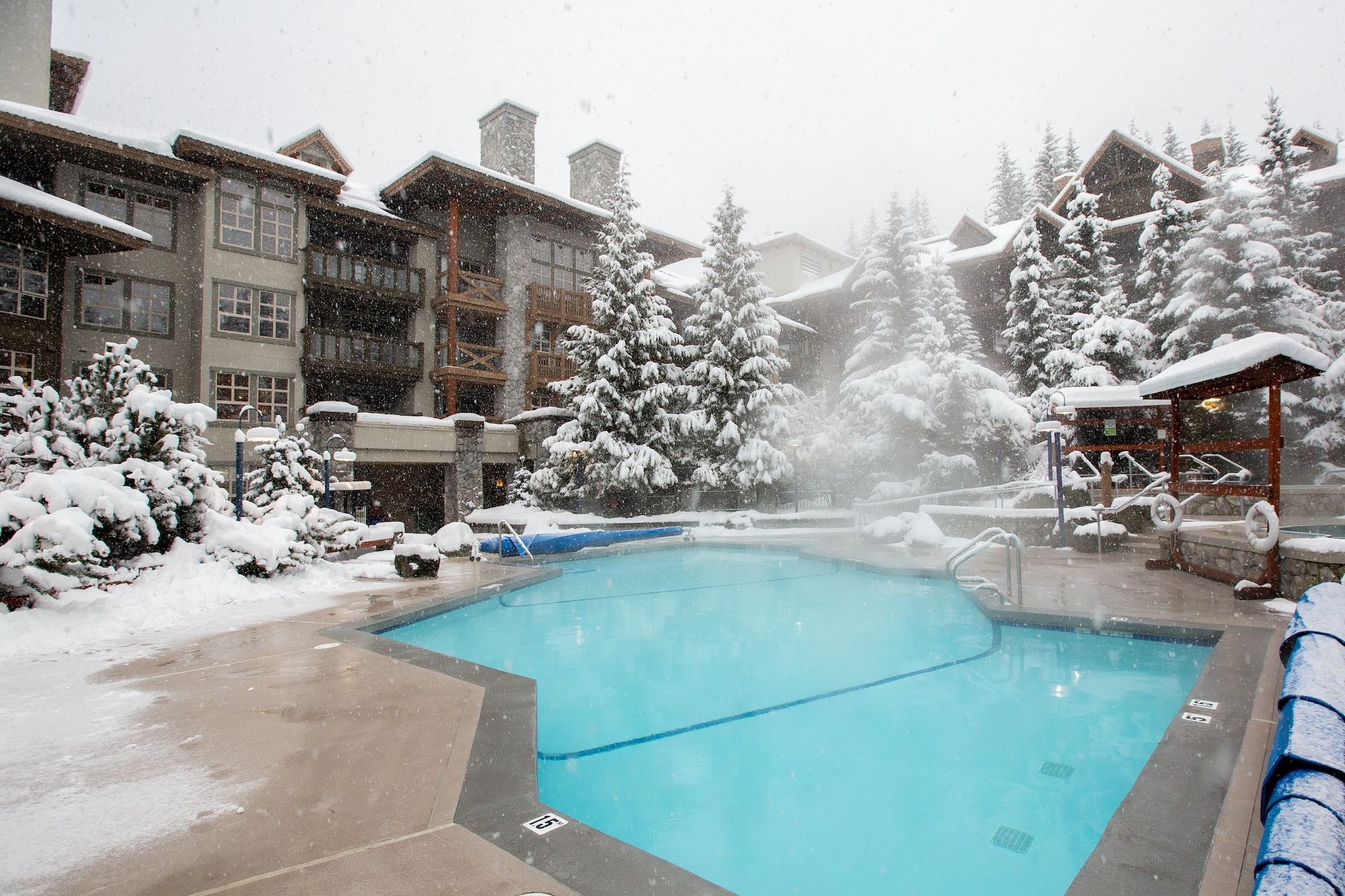 image Heated outdoor pool with snowy mountain views. Ski-in, ski-out convenience!