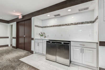 Sleek kitchen space for hosting and preparing meals.