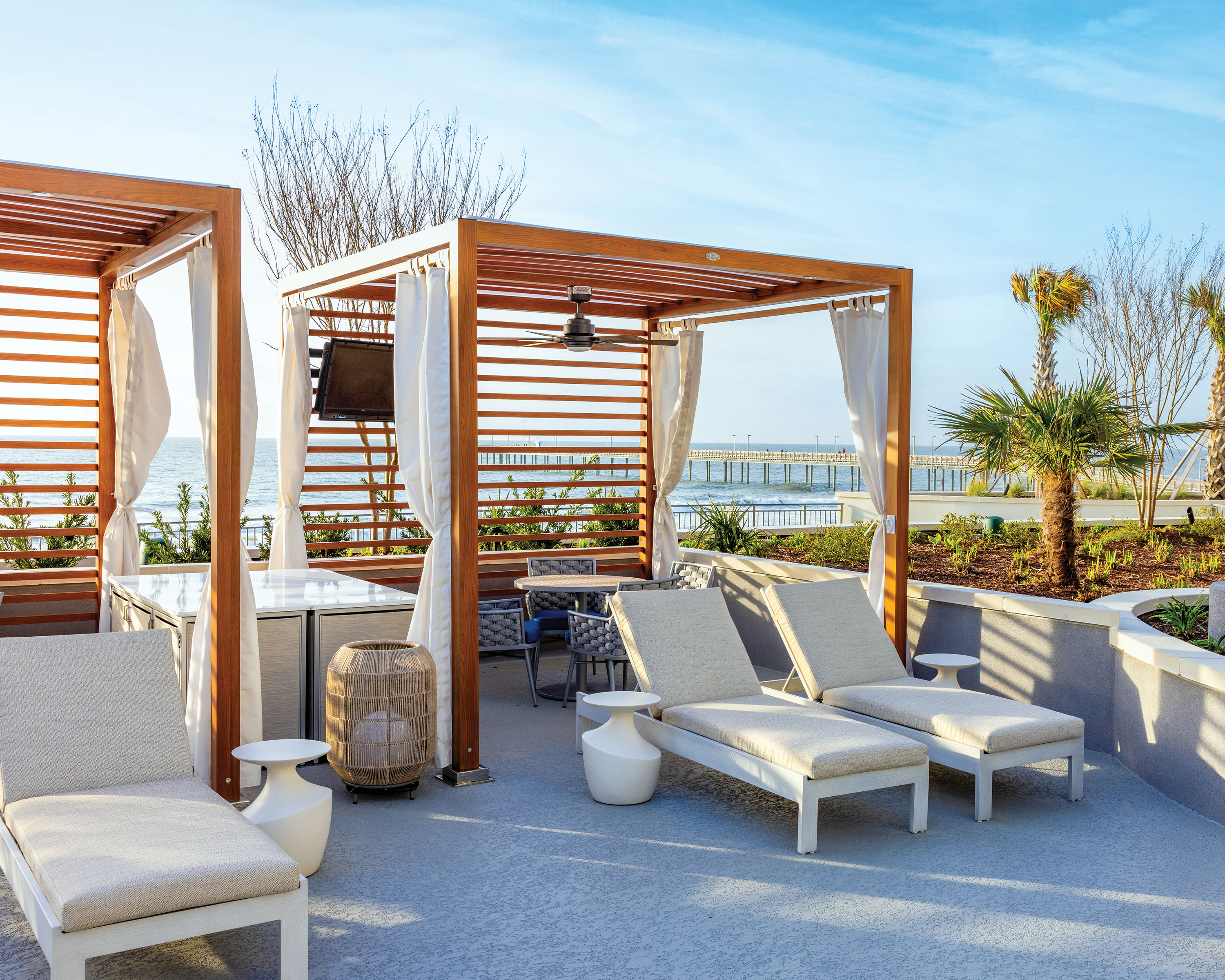 image Unwind in shaded poolside cabanas, offering a relaxing escape right by the water.