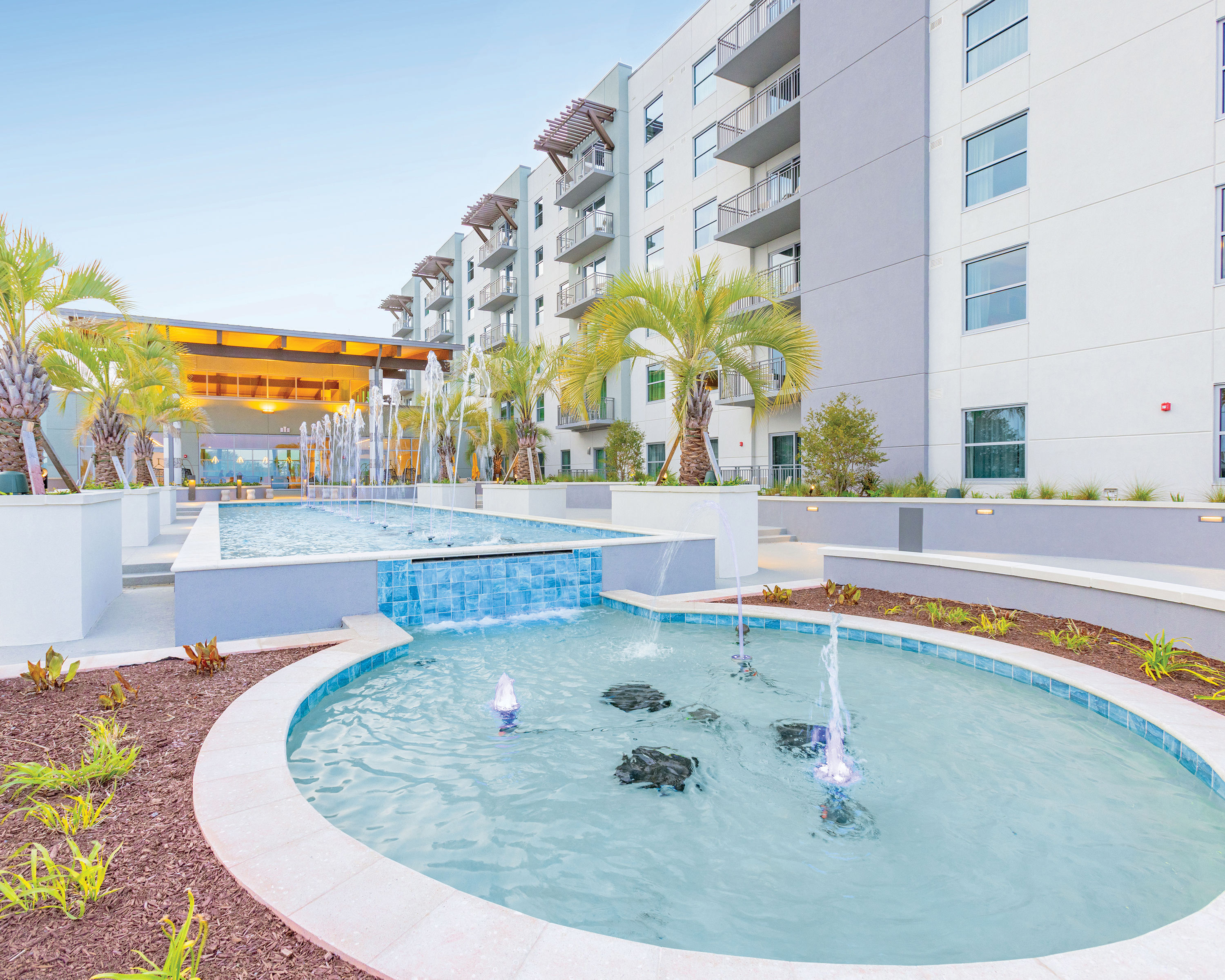 image Enjoy the splash fountain, perfect for kids and adults to cool off in a fun, interactive way.