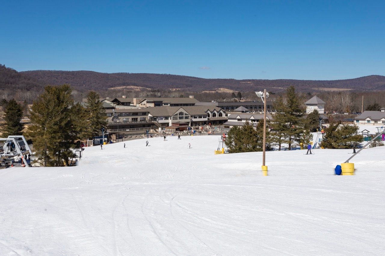 image Snow-covered trails with breathtaking valley views invite you to carve your perfect run.