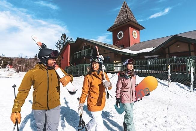 image Enjoy the snowy landscape with the backdrop of an iconic clock tower. 