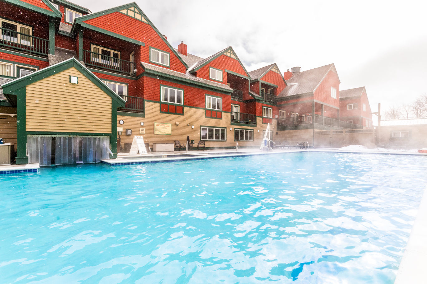 image Steam rises from the warm water, creating a cozy escape after a day of adventure on the slopes.