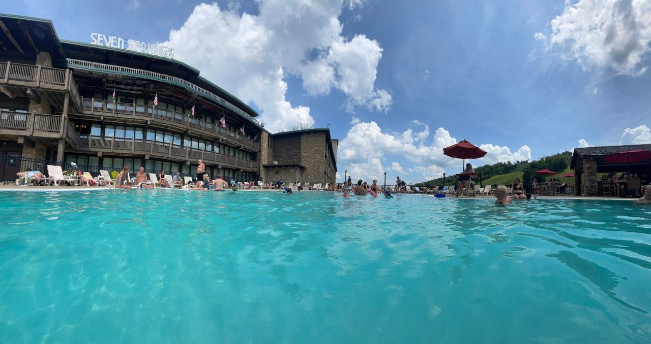 image Inviting poolside experience with panoramic views and open skies, ideal for unwinding and enjoying the fresh mountain air.