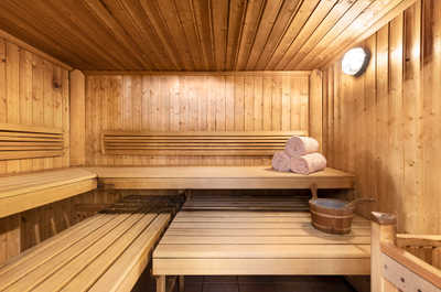  Unwind in the calming sauna, a perfect spot to release tension and enjoy a peaceful moment of relaxation after a day of exploring.