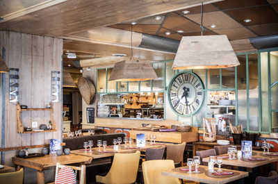 Enjoy an authentic dining experience at Restaurant LE CHALET, featuring Savoyard and Alsatian specialties in a warm, inviting atmosphere.