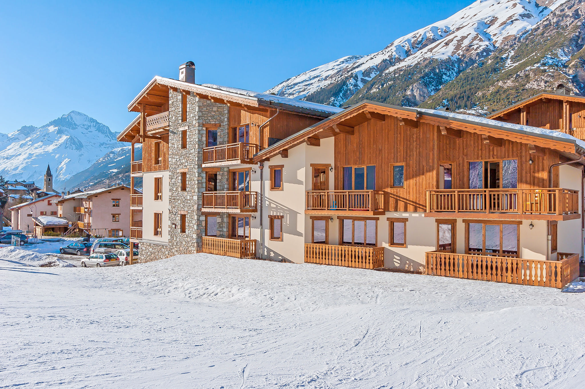 image This charming chalet blends seamlessly with its natural surroundings, offering a warm and inviting space to unwind after an exhilarating day on the slopes.