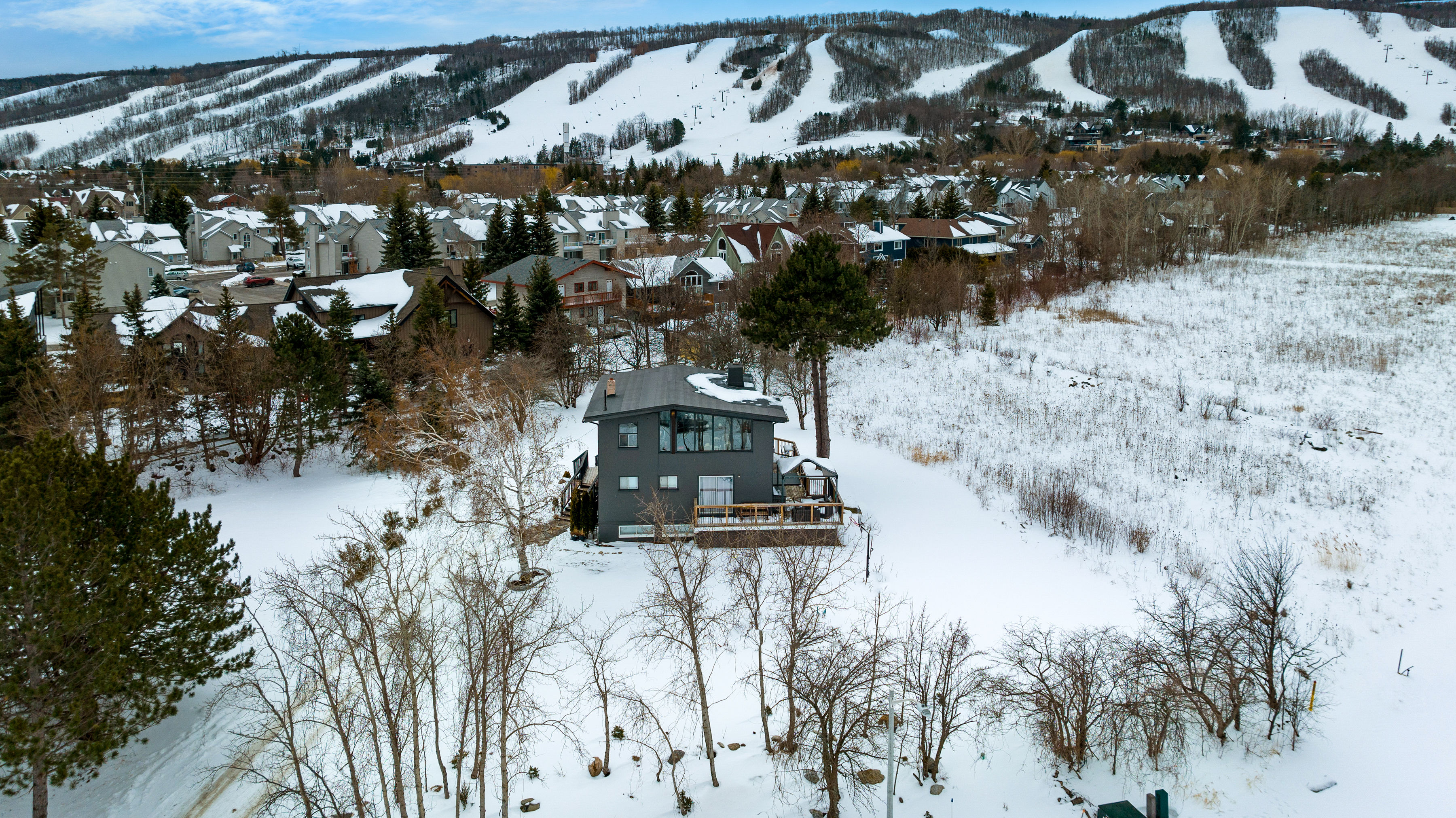 image Enjoy prime access to the slopes, just minutes from this cozy winter retreat.