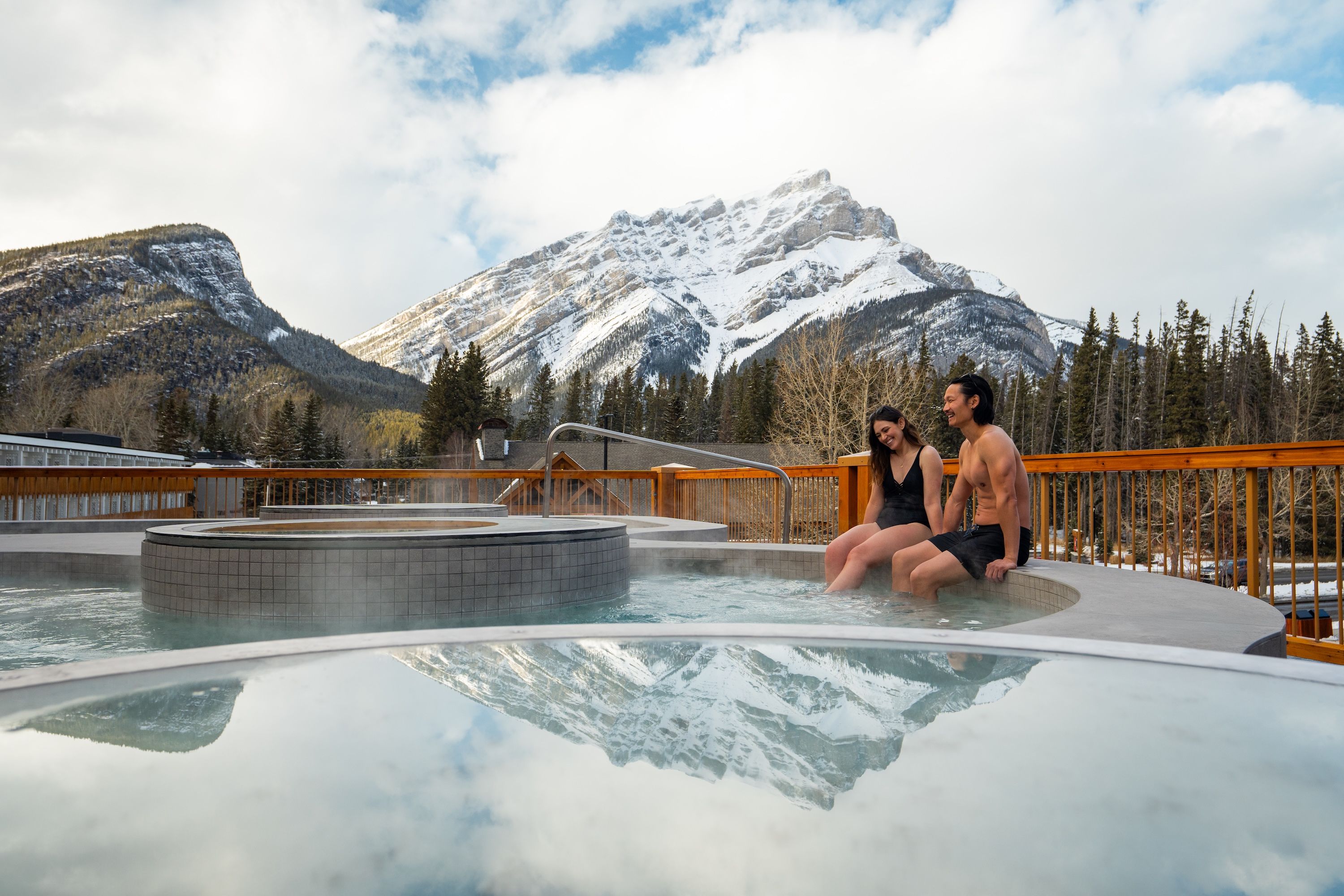image Relax in the hot tub as snow-capped peaks frame the view.