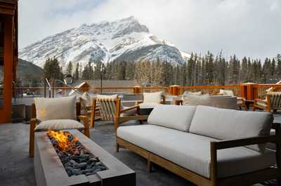 Gather around the fire pit on the terrace, sharing stories with the mountains as your backdrop.